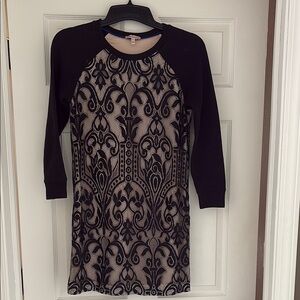 Elegant Black and Cream Patterned Dress